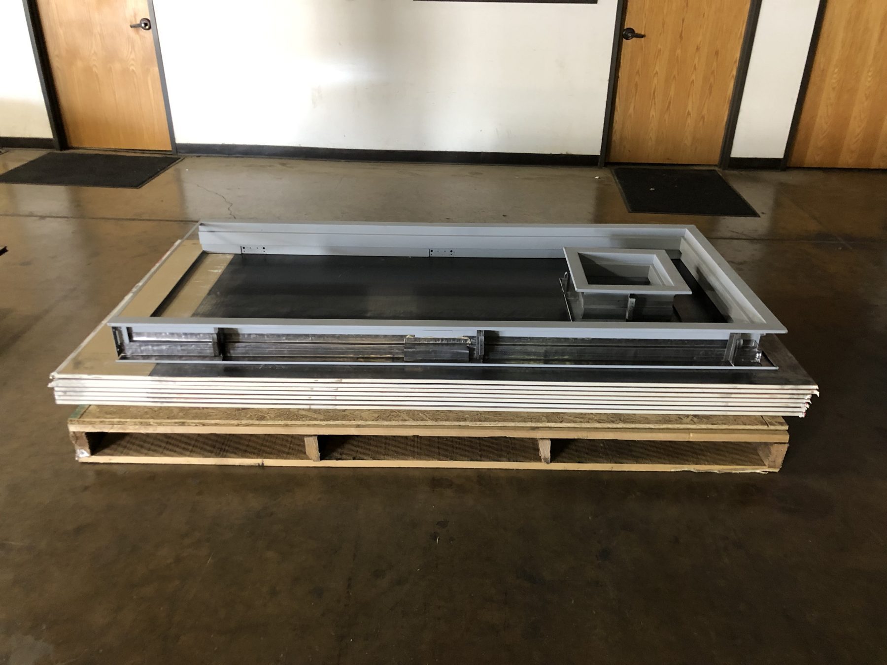 Finished lead-lined component staged for delivery.