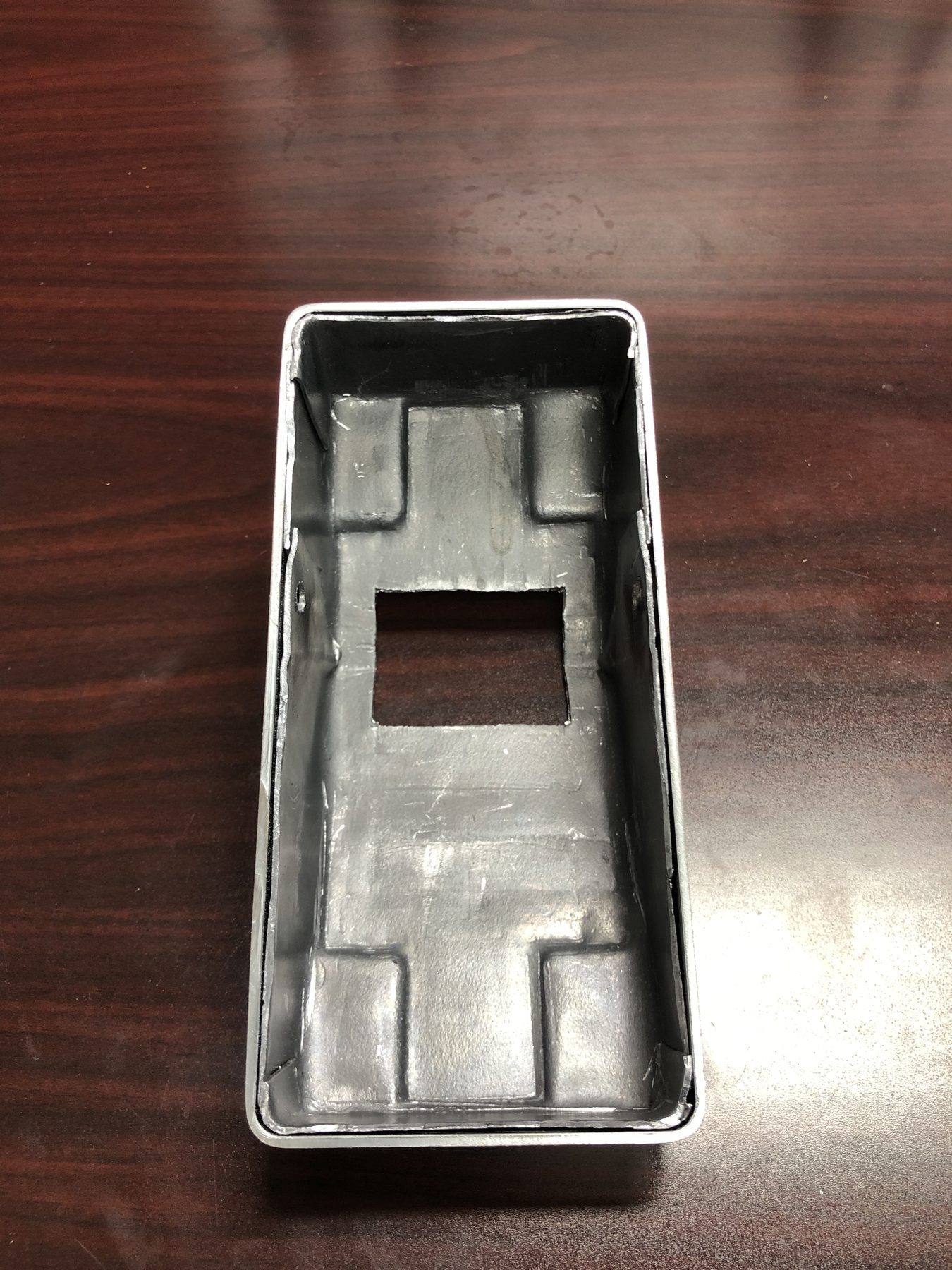 Close-up of a fabricated shielded cover.