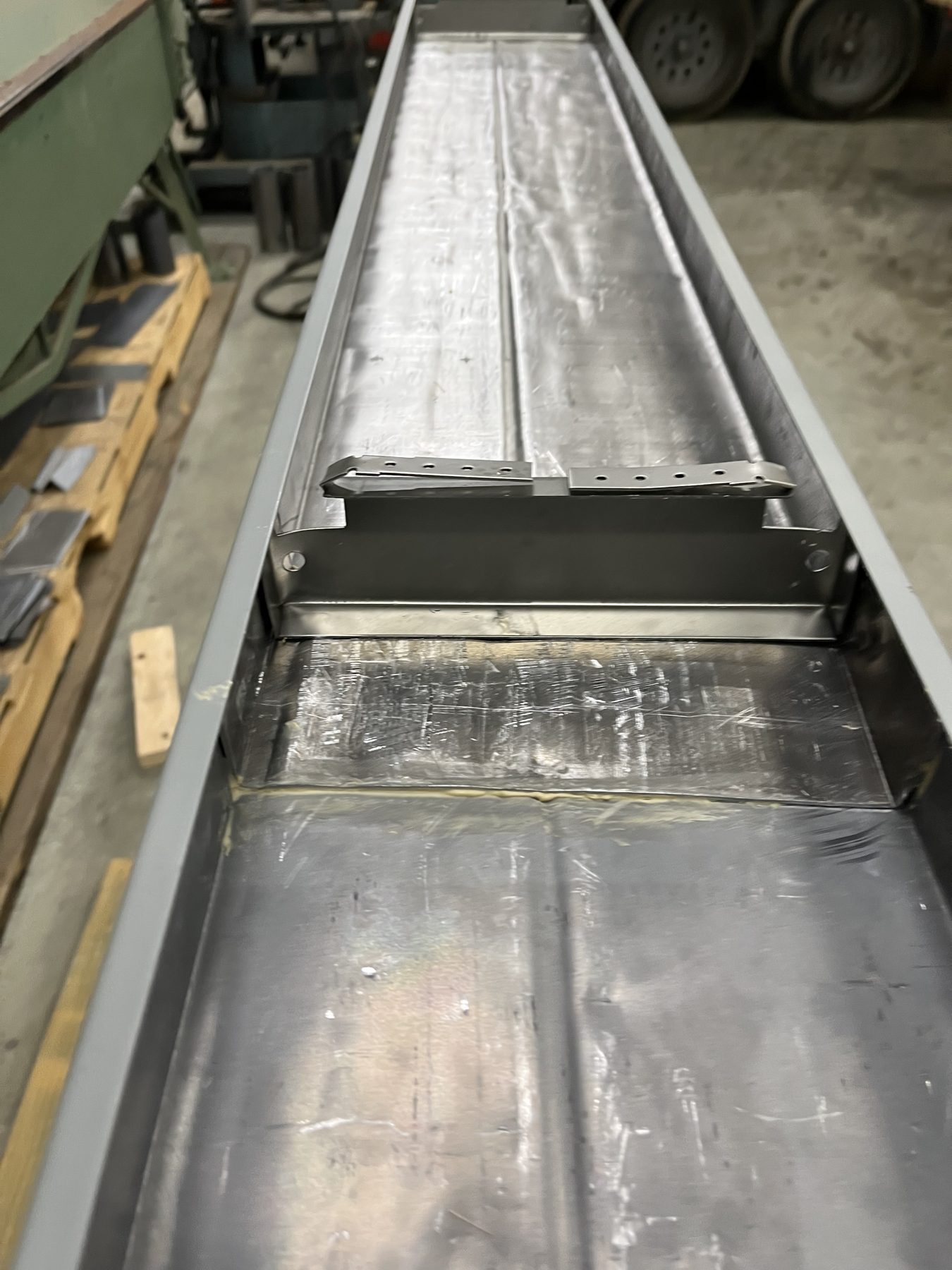 Shielded frame assembly during fabrication.