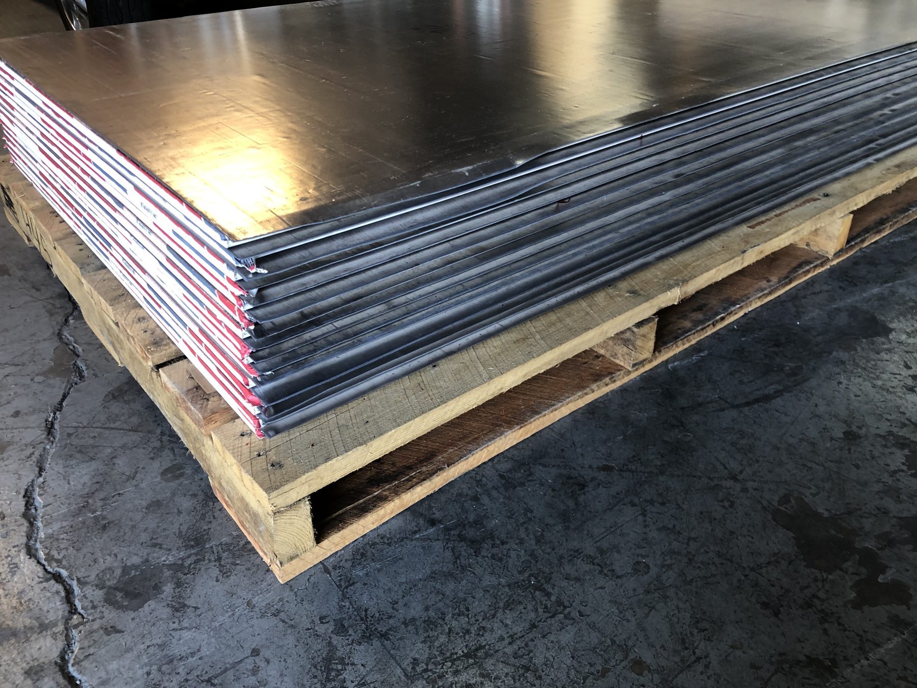 Stacked lead-lined sheet materials.